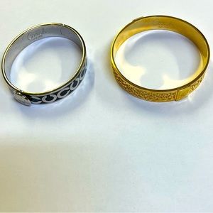 2 pre-owned authentic Coach bangle bracelets. 1 silver, 1 gold.